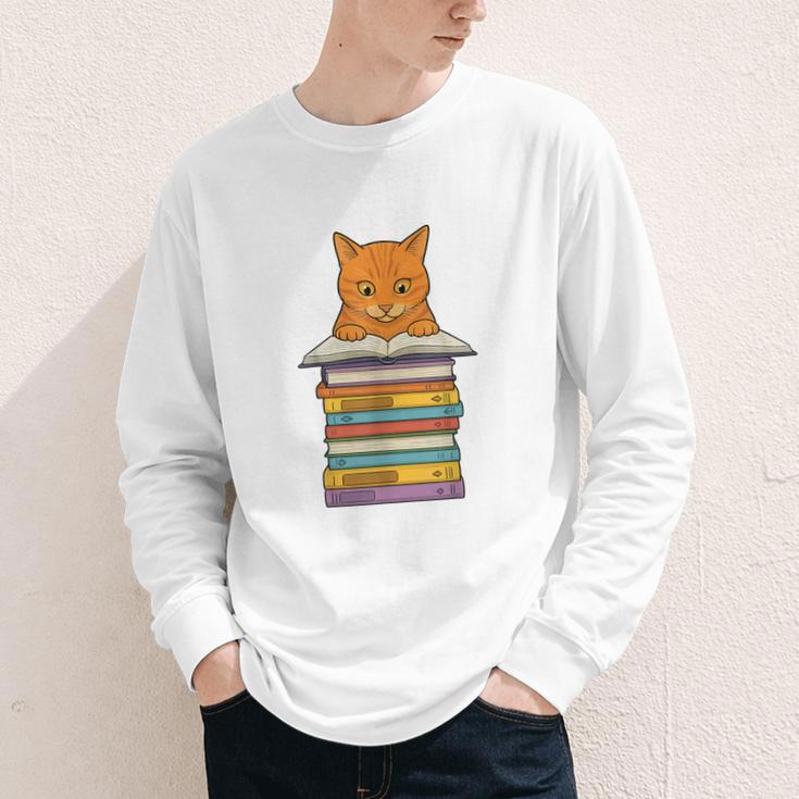 Cute Orange Tabby Cat Reading On Pile Of Books Youth Long Sleeve Tee