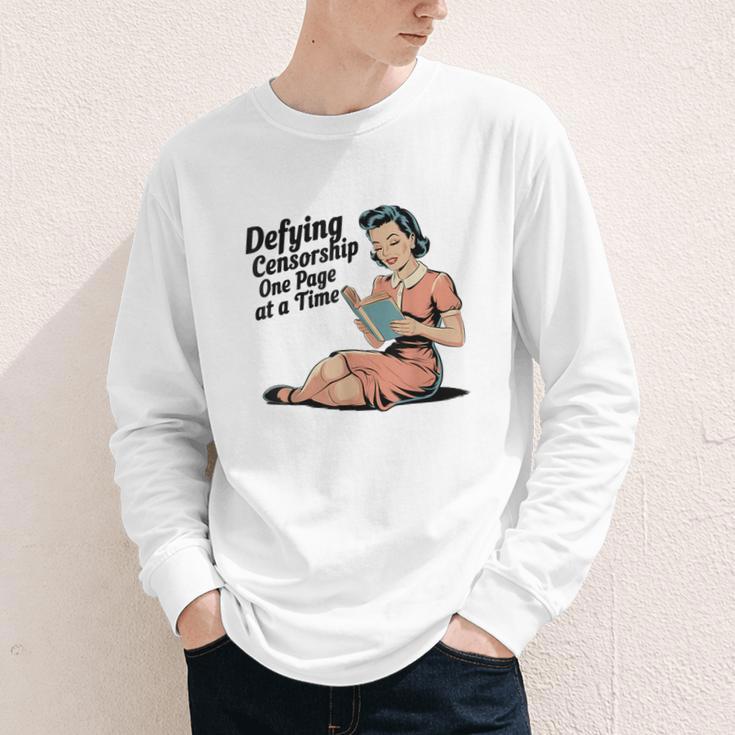 Defying Censorship One Page At a Time Read Banned Books Youth Long Sleeve Tee