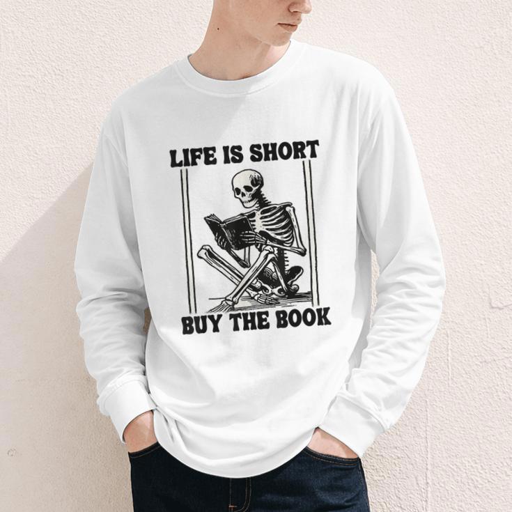 Life Is Short Buy The Book Skeleton Book Lover Reading Youth Long Sleeve Tee Life Is Short Buy The Book Skeleton Book Lover Reading Youth Long Sleeve Tee