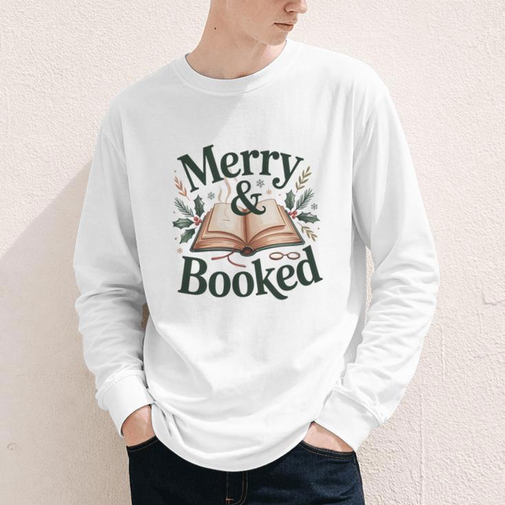 Merry And Booked Holiday Reading Winter Book Lover Premium Tri-Blend Youth Long Sleeve Tee Merry And Booked Holiday Reading Winter Book Lover Premium Tri-Blend Youth Long Sleeve Tee