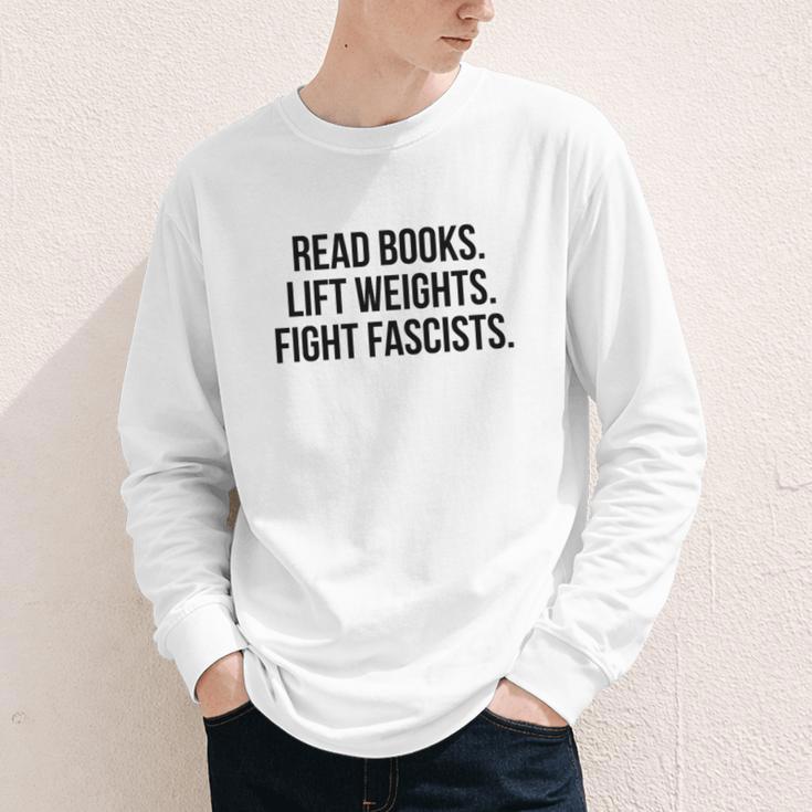 Read Books Lift Weights Fight Fascists Premium Tri-Blend Youth Long Sleeve Tee