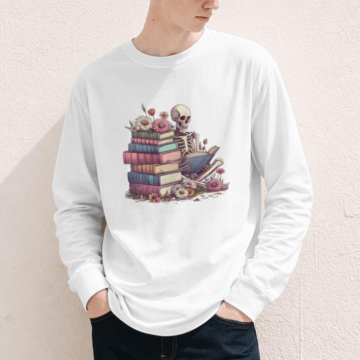 Reading A Book Per Day Keeps Reality Away Skeleton Books Youth Long Sleeve Tee Reading A Book Per Day Keeps Reality Away Skeleton Books Youth Long Sleeve Tee