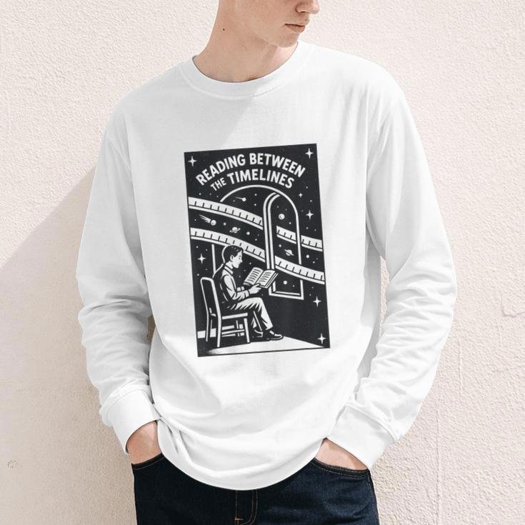 Reading Between The Timelines Time Travel Books Youth Long Sleeve Tee