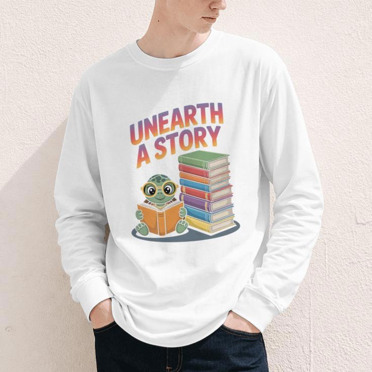 Unearth A Story Cute Turtle Reading Books Librarian Youth Long Sleeve Tee