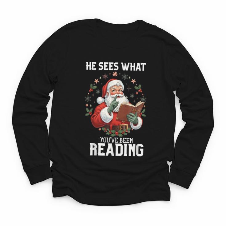 He Sees What You'Ve Been Reading Santa Book Lover Youth Long Sleeve Tee