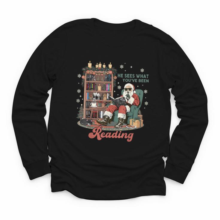 He Sees What You'Ve Been Reading Santa Christmas Bookish Youth Long Sleeve Tee