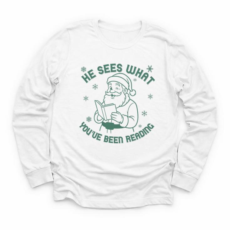 He Sees What You'Ve Been Reading Christmas Bookish Santa Premium Tri-Blend Youth Long Sleeve Tee