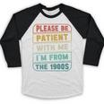 Retro Humor Please Be Patient With Me I'm From The 1900s Premium Baseball Raglan Shirt Retro Humor Please Be Patient With Me I'm From The 1900s Premium Baseball Raglan Shirt