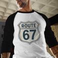Retro Route 67 Highway Sign Vintage Road Nostalgia Baseball Raglan Shirt Retro Route 67 Highway Sign Vintage Road Nostalgia Baseball Raglan Shirt
