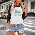 Still Loading Since 1999 Retro Tech Nostalgia Premium Tri-Blend Baseball Raglan Shirt