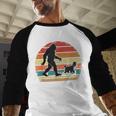 Bigfoot Walking a Dog Bernedoodle Dog Dad Men Baseball Raglan Shirt
