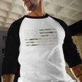 Just a Regular Dad Trying Not To Raise Liberals Camouflage Men Baseball Raglan Shirt