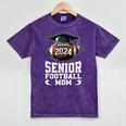 Class Of 2024 Graduation Senior Football Mom 2024 Mineral Wash Tshirts Mineral Purple