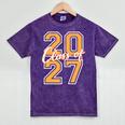 Class Of 2027 Graduation Varsity Orange On The Back Premium Tri-Blend Mineral Wash Tshirts Mineral Purple