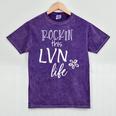 Rockin This Life Cute LVN Graphic For Nurse Graduation Mineral Wash Tshirts Mineral Purple