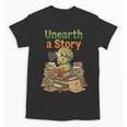 Unearth a Story Triceratops Dinosaur Reading Books Cute Dino Unisex T-Shirt Unearth a Story Triceratops Dinosaur Reading Books Cute Dino Unisex T-Shirt