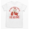 He Sees What You'Ve Been Reading Santa Book Unisex T-Shirt He Sees What You'Ve Been Reading Santa Book Unisex T-Shirt