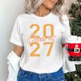 Class Of 2027 Graduation Varsity Orange On The Back Premium Tri-Blend Unisex T-Shirt
