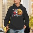 Santa Holding Cookie Xmas Baker Introvert Christmas Unisex Hoodie
