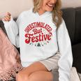 Overstimulated But Festive – Christmas Introvert Humor Unisex Hoodie