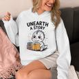 Unearth a Story Cute Dinosaur Summer Reading 2026 Dino Book Unisex Hoodie