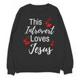 This Introvert Loves Jesus Religious Red Hearts Graphic Unisex Sweatshirt This Introvert Loves Jesus Religious Red Hearts Graphic Unisex Sweatshirt