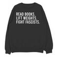 Read Books Lift Weights Fight Fascists Reading Activism Unisex Sweatshirt Read Books Lift Weights Fight Fascists Reading Activism Unisex Sweatshirt