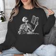 Hilarious Skeleton Holding a Book And Laughing Gothic Unisex Sweatshirt