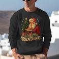 He Sees What You’Ve Been Reading Santa Book Lover Christmas Unisex Sweatshirt He Sees What You’Ve Been Reading Santa Book Lover Christmas Unisex Sweatshirt