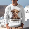 Highland Cow Reading Book Bookworm Unisex Sweatshirt
