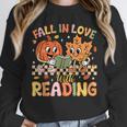 Fall In Love With Reading Autumn Pumpkin Teacher Book Lover Unisex Sweatshirt