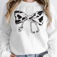 Cow Print Bow And Stethoscope Nurse RN Graduation Coquette Unisex Sweatshirt