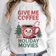 Give Me Coffee And Holiday Movies Introvert Christmas Unisex Sweatshirt