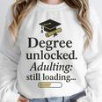 Graduation 2025 Degree Unlocked Adulting Still Loading Unisex Sweatshirt