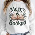 Merry And Booked Holiday Reading Winter Book Lover Premium Tri-Blend Unisex Sweatshirt