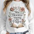 She Blooms Among The Pages Women Mom Wife Floral Book Lover Premium Tri-Blend Unisex Sweatshirt She Blooms Among The Pages Women Mom Wife Floral Book Lover Premium Tri-Blend Unisex Sweatshirt
