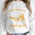 Woman Survives On Books Yarn Knitting Crochet Premium Tri-Blend Unisex Sweatshirt
