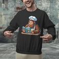 Bigfoot Reading a Cookbook Unisex Sweatshirt