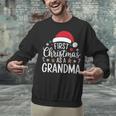 First Christmas As A Grandma Holiday New Grandmother Memory Unisex Sweatshirt First Christmas As A Grandma Holiday New Grandmother Memory Unisex Sweatshirt