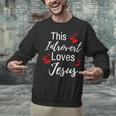 This Introvert Loves Jesus Religious Red Hearts Graphic Unisex Sweatshirt This Introvert Loves Jesus Religious Red Hearts Graphic Unisex Sweatshirt
