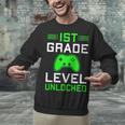 Kids 1st Grade Level Unlocked Back To School Gamer Graduation Unisex Sweatshirt