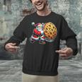 Santa Holding Cookie Xmas Baker Introvert Christmas Unisex Sweatshirt