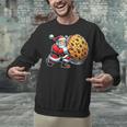 Santa Holding Cookie Xmas Baker Introvert Christmas Unisex Sweatshirt Santa Holding Cookie Xmas Baker Introvert Christmas Unisex Sweatshirt
