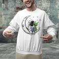Astronaut Reading Book To Alien Moon Space Astronomy Unisex Sweatshirt
