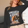 Unearth A Story Rainbow Treasure Book Unisex Long Sleeve T-Shirt Unearth A Story Rainbow Treasure Book Unisex Long Sleeve T-Shirt