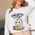 Unearth a Story Cute Dinosaur Summer Reading 2026 Dino Book Unisex Long Sleeve T-Shirt