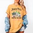 Holiday Scene Nostalgia North Pole Tree Farm Merry Christmas Women's Comfort Colors T-Shirt Mustard Holiday Scene Nostalgia North Pole Tree Farm Merry Christmas Women's Comfort Colors T-Shirt Mustard