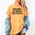 Read Books Lift Weights Fight Fascists Premium Tri-Blend Women's Comfort Colors T-Shirt Mustard Read Books Lift Weights Fight Fascists Premium Tri-Blend Women's Comfort Colors T-Shirt Mustard
