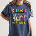 Everyone Communicates Differently Book Teacher Outfit Women's Comfort Colors T-Shirt Moss