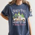 North Pole Tree Farm Merry Christmas Holiday Scene Nostalgia Women's Comfort Colors T-Shirt Moss North Pole Tree Farm Merry Christmas Holiday Scene Nostalgia Women's Comfort Colors T-Shirt Moss
